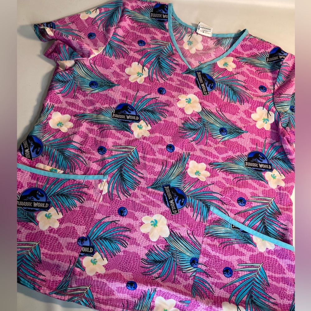 Jurassic World purple tropical dinosaur scrub top Large